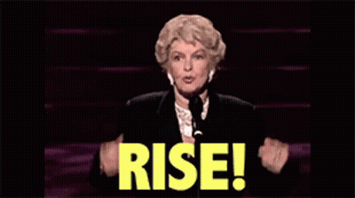 Woman At Microphone With Yellow Rise GIF