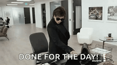 Woman At Office Desk Done For The Day GIF