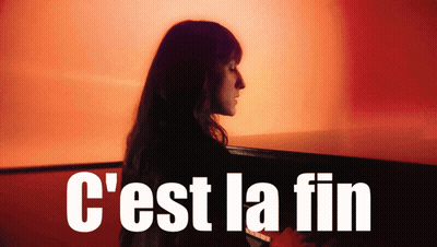 Woman at Piano Saying C'est La Fin