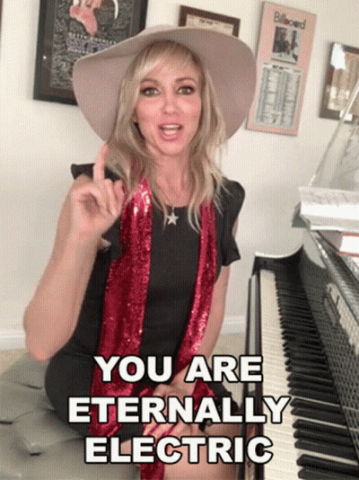 Woman At Piano Saying You Are Eternally Electric GIF