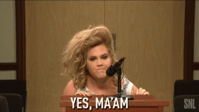 Woman At Podium Saying Yes GIF