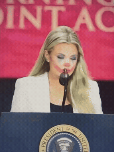 Woman At Presidential Podium GIF