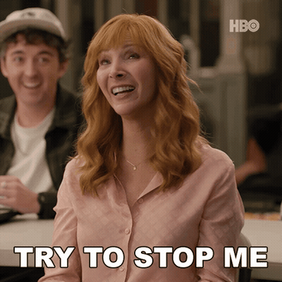Woman At Table Saying Try To Stop Me GIF