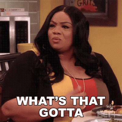 Woman At Table Says What's That Gotta GIF