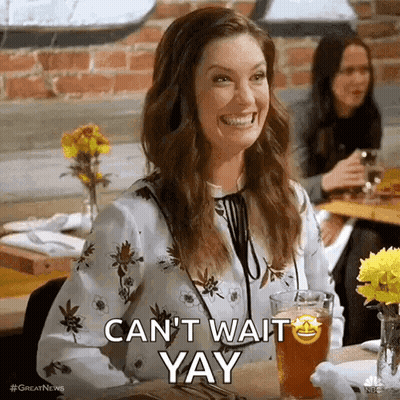 Woman At Table With Beer And Smiley Face GIF