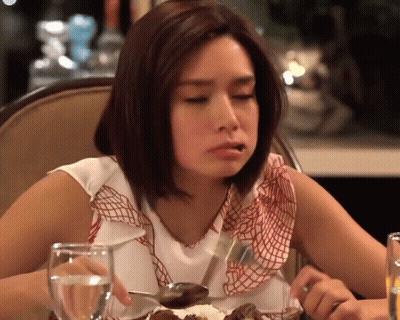Woman At Table With Food And Water GIF
