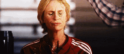 Woman Bathed With Glitter Bomb GIF