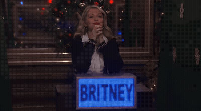 Woman Behind Box Saying Britney GIF