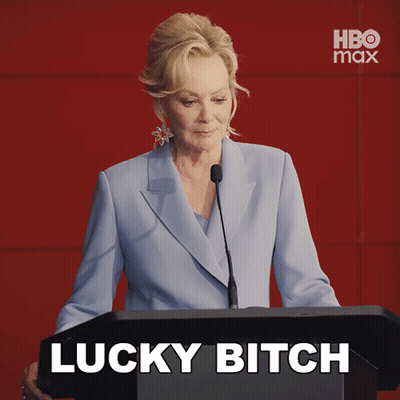 Woman Behind Podium Saying Lucky Bitch GIF