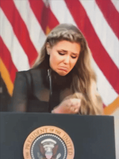 Woman Behind Presidential Podium GIF