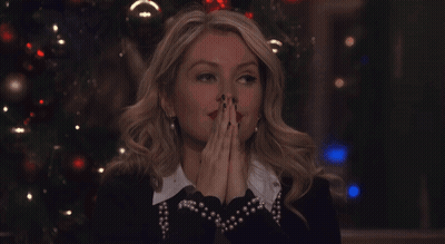 Woman Behind Sign Saying Britney GIF