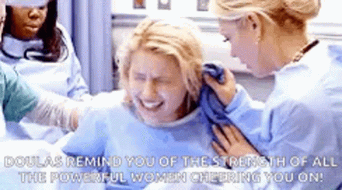 Woman Being Helped By Nurse GIF