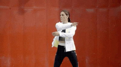 Woman Bending Over Red Wall White Black GIF