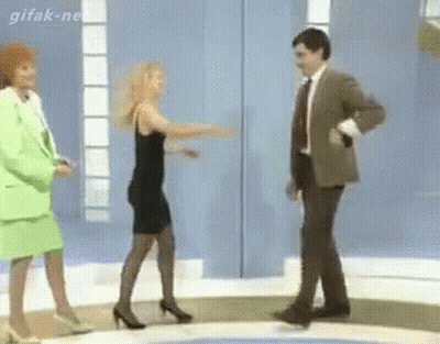 Woman Black Dress Man Suit Tie Dancing GIF