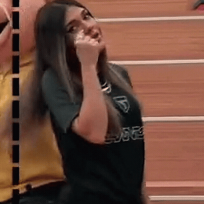 Woman Black Shirt Funny Face Beside Man GIF