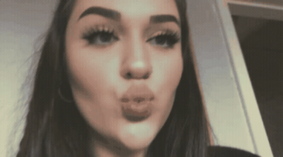 Woman Blowing A Kiss GIF