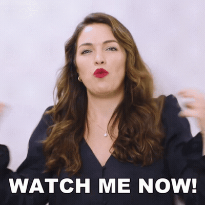 Woman Blowing A Kiss Saying Watch Me Now GIF