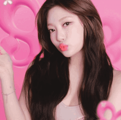 Woman Blowing Kiss With Pink Heart GIF