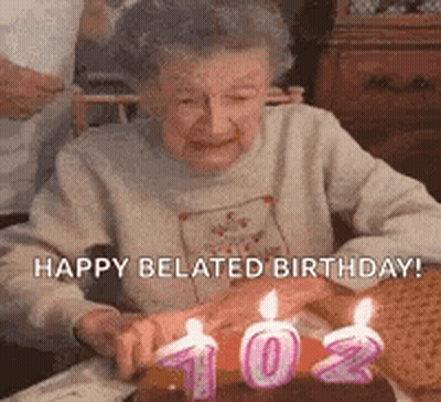 Woman Blowing Out Birthday Cake Candles GIF