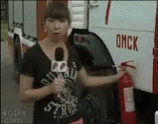 Woman Blown Away By Fire Extinguisher GIF