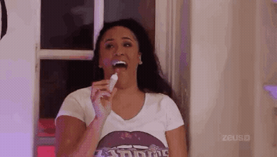 Woman Brushing Teeth In White Shirt GIF