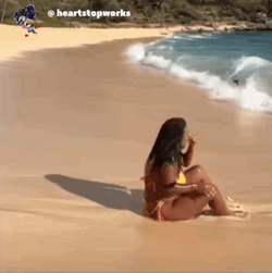 Woman Carried By Waves Funny Beach GIF