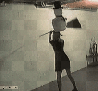 Woman Carrying Snowman On Head Holding Stick GIF