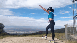 Woman Cartwheel In The Mountain GIF