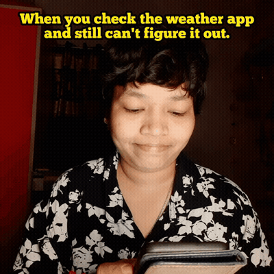 Woman Checking Phone Saying When You Check The Weather App And Still Can't Figure It Out GIF