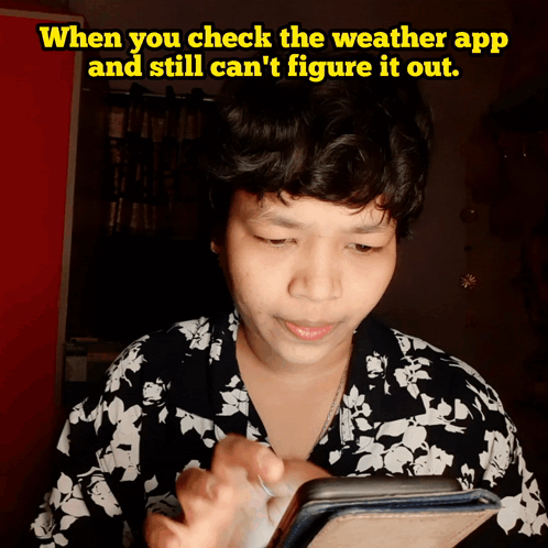 Woman Checking Weather App On Cell Phone GIF