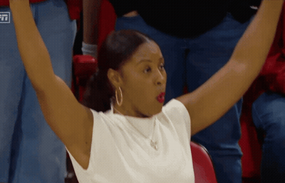Woman Cheering At Stadium With ESPN Sign GIF