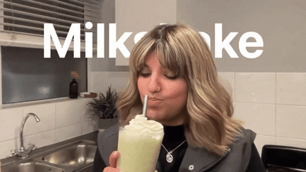 Woman Cheers Milkshake  GIF