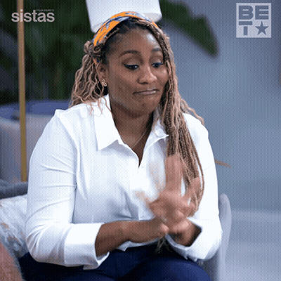 Woman Clapping In Front Of BE TV Logo GIF