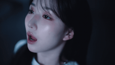 Woman Close Up In Dark GIF