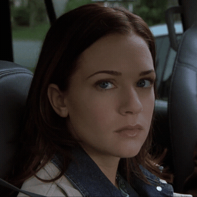 Woman Close Up Looking At Camera GIF