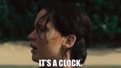 Woman Close Up Saying It's A Clock GIF