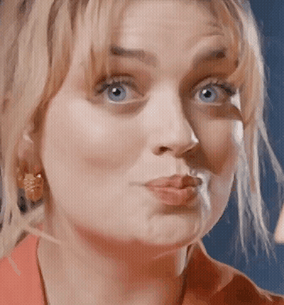 Woman Close Up With Blue Eyes GIF
