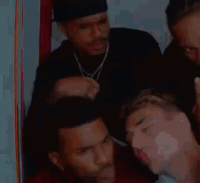 Woman Close-Up With Crowd GIF