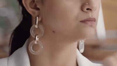Woman Close Up With Earrings GIF