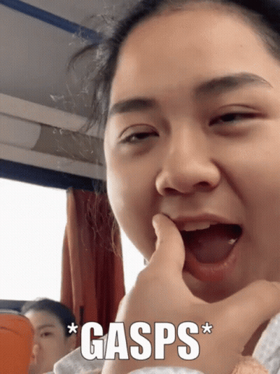 Woman Close Up With Gasp GIF