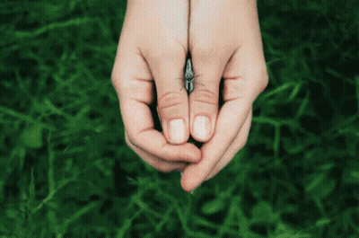 Woman Close Up With Ki-Figols GIF