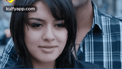 Woman Close Up With Man In Plaid Shirt GIF