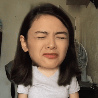 Woman Closing Eyes Funny Face GIF