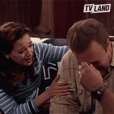 Woman Comforting Man Covering Face GIF