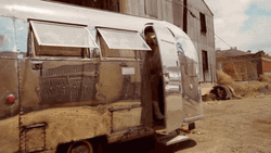 Woman Coming Out From Camper Trailer GIF