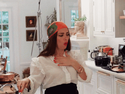 Woman Cooking In Kitchen With Ecoffice Bag GIF