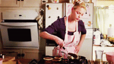 Woman Cooking Pancakes On Stove GIF
