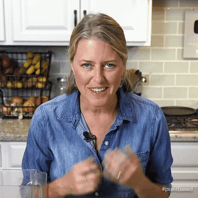 Woman Cooking Pancakes On Stove GIF