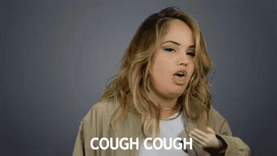 Woman Coughing With Hand On Chest Saying Cough Cough GIF