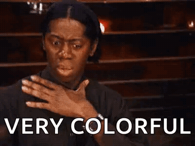 Woman Covering Chest Saying Very Colorful GIF